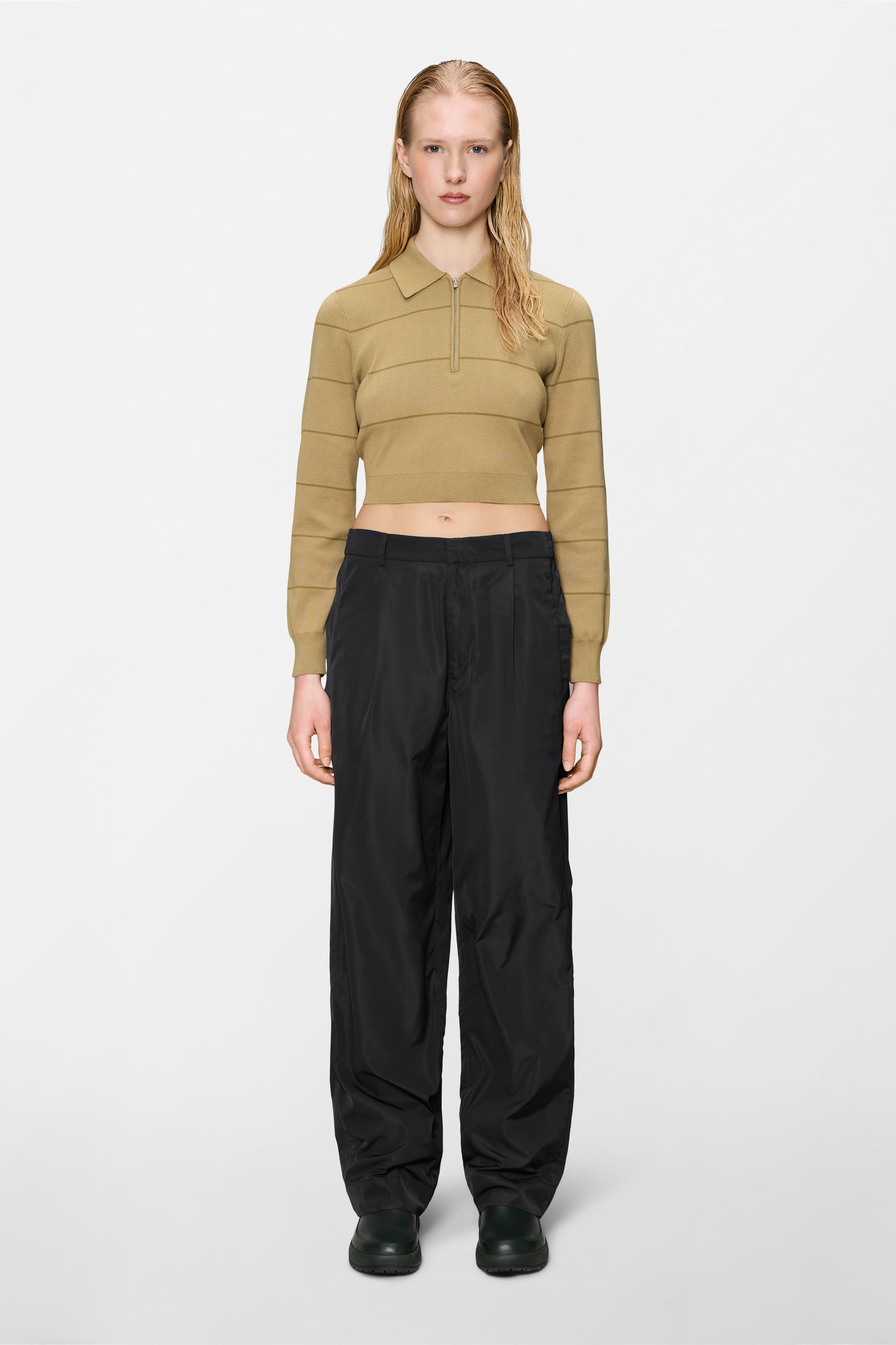 Polo a maglia a righe con maniche lunghe